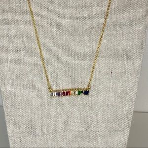 Gold chain and rainbow necklace